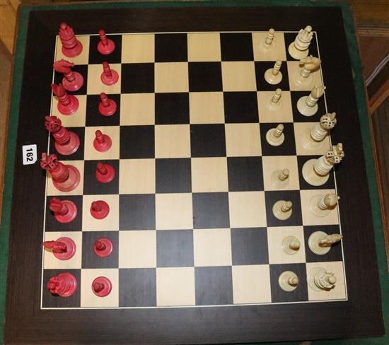 Ivory chess set on board